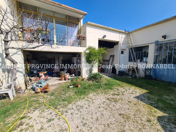 Maison proche centre-ville avec un appartement loué