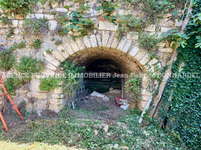 Grange à rénover au cœur du village